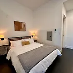 Flexhome Skywalk To Fiserv U9 With Rooftop, Gym, And Parking