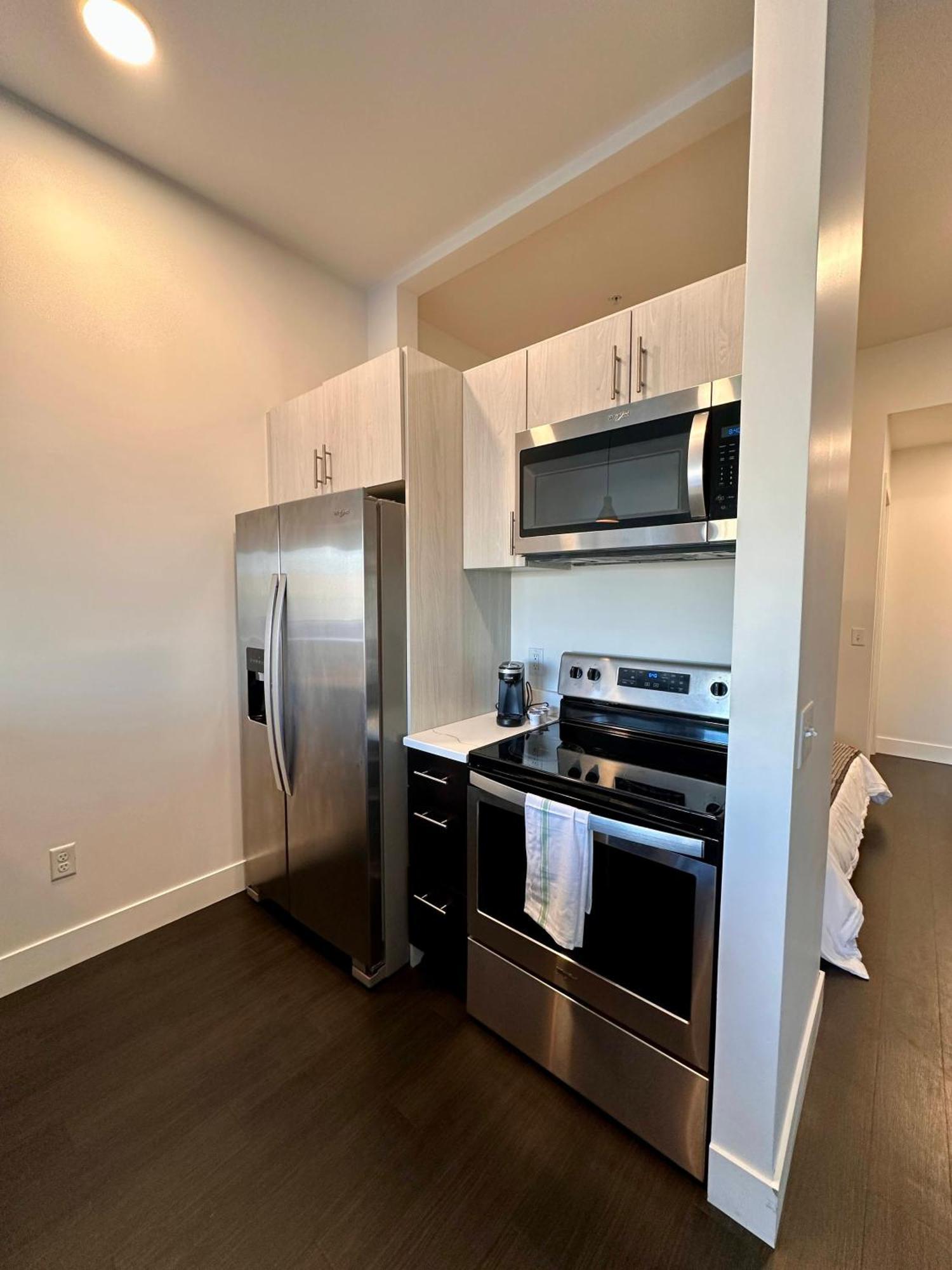 Flexhome Skywalk To Fiserv U9 With Rooftop, Gym, And Parking