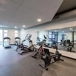 Flexhome Skywalk To Fiserv U4 With Rooftop, Gym, And Parking